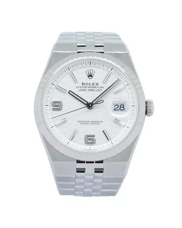 Rolex Land-Dweller 40 Ref. 127334 in White Rolesor, featuring an intense white honeycomb-motif dial, fluted 18 ct white gold bezel, date display with Cyclops lens, and integrated Flat Jubilee bracelet.